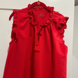 Red sleeveless shirt